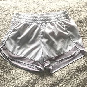Brand new Athleta mesh racer run short 4. Size Small